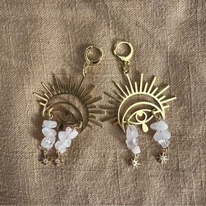 rose gold seeing eye huggie hoop earrings